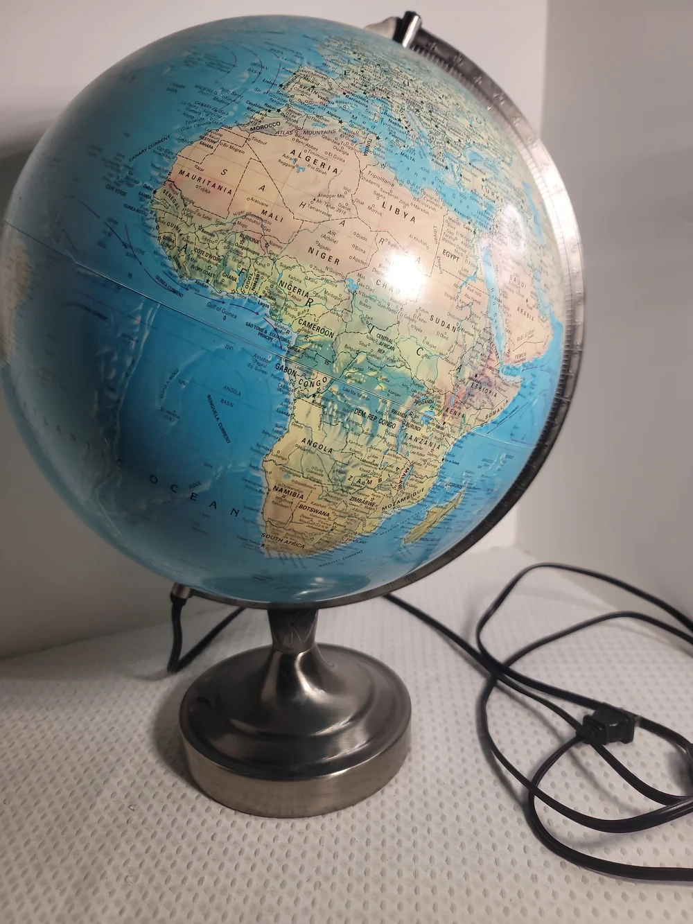 Illuminated Blue Table Globe on Metal Stand